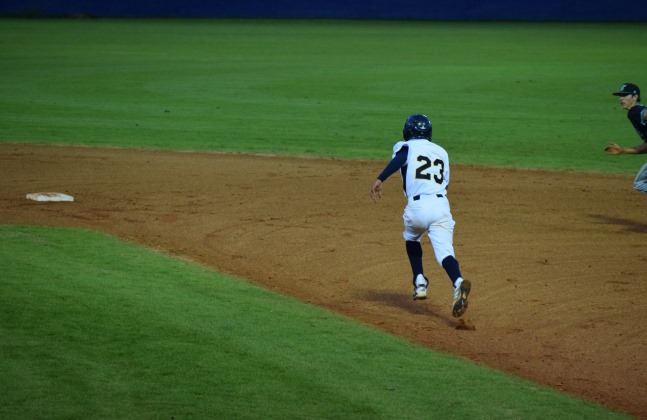 Jordan Holt and one of his 35 stolen bases this year.